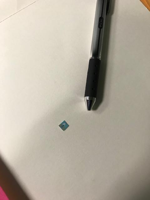 Picture of this drug which is small, square, blue in color with what appears to be a bicycle. 