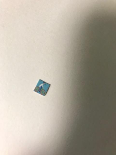 Picture of this drug which is small, square, blue in color with what appears to be a bicycle design.